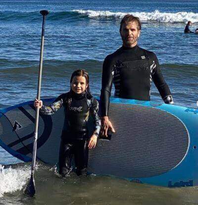 Brit Madison with her father David Chokachi after surfing